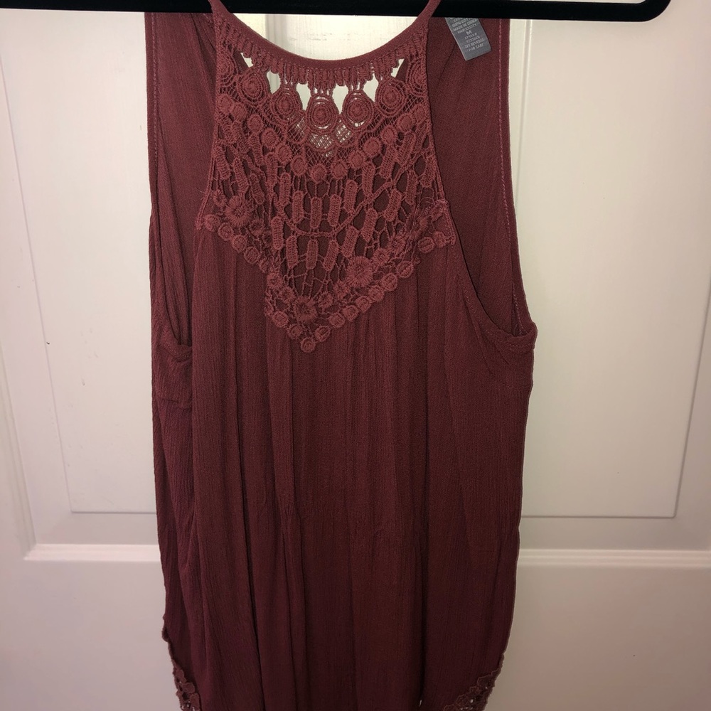 Tank top with detailing at top and sides